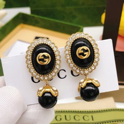 Gucci round black earrings